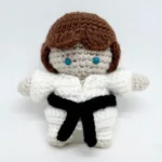Figura decorativa de Jiu-Jitsu cinturón negro amigurumi