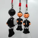 Detalle de tanque de oxígeno en llaveros de buzo