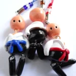 Llaveros de Hapkido cinturones azul rojo y marrón