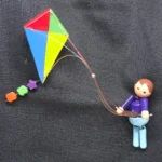 Prendedor cometero artesanal colores festival Dieppe